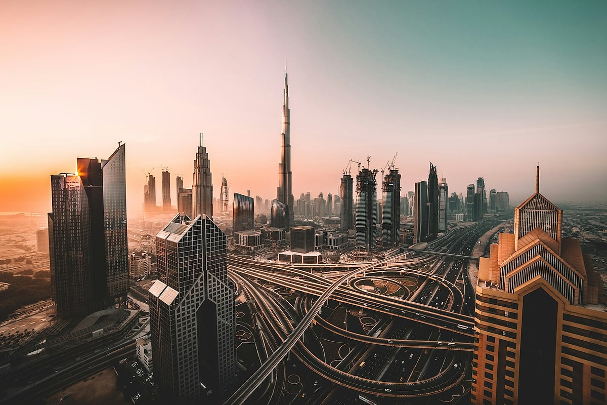 Dubai at sunrise: Burj Khalifa above the Sheikh Zayed Road interchange